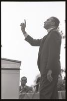 Alternate view of former U.S. Representative Adam Clayton Powell pointing as he addresses an audience in the Woods-Brown Amphitheater at American University, 13 October 1968