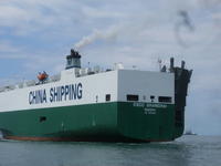 A Chinese cargo ship passes through Lake Gatun, Panama 